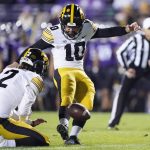 
              Iowa place kicker Caleb Shudak bootss an extra point during the first half of an NCAA college football game against Northwestern in Evanston, Ill., Saturday, Nov. 6, 2021. (AP Photo/Nam Y. Huh)
            