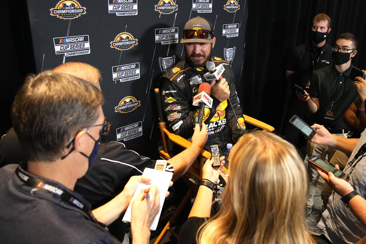 Driver Martin Truex Jr. speaks during media day ahead of Sunday's NASCAR Cup Series championship au...