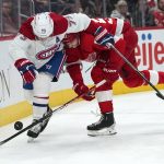 
              Montreal Canadiens right wing Tyler Toffoli (73) and Detroit Red Wings defenseman Moritz Seider (53) battle for the puck in the third period of an NHL hockey game Saturday, Nov. 13, 2021, in Detroit. (AP Photo/Paul Sancya)
            