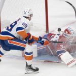 
              New York Islanders' Brock Nelson (29) scores on Montreal Canadiens goaltender Jake Allen (34) during the second period of an NHL hockey game Thursday, Nov. 4, 2021, in Montreal. (Ryan Remiorz/The Canadian Press via AP)
            
