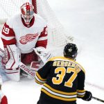 
              Detroit Red Wings goaltender Thomas Greiss (29) drops to the ice on a goal by Boston Bruins center Patrice Bergeron (37) during the third period of an NHL hockey game Thursday, Nov. 4, 2021, in Boston. (AP Photo/Charles Krupa)
            