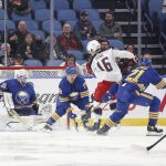 
              Columbus Blue Jackets center Max Domi (16) scores a goal against the defense of Buffalo Sabres defenseman Jacob Bryson (78) and goaltender Dustin Tokarski (31) during the second period of an NHL hockey game on Monday, Nov. 22, 2021, in Buffalo, N.Y. (AP Photo/Joshua Bessex)
            