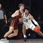 
              In a photo provided by Bahamas Visual Services, Michigan State forward Malik Hall (25) looks for an outlet as Loyola-Chicago forward Tom Welch (10) defends during an NCAA college basketball game at Paradise Island, Bahamas, Wednesday, Nov. 24, 2021. (Tim Aylen/Bahamas Visual Services via AP)
            