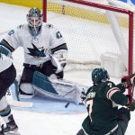 
              Minnesota Wild's Nico Sturm (7) shoots but the shot is blocked by San Jose Sharks goalie James Reimer (47) during the first period of an NHL hockey game Tuesday, Nov. 16, 2021, in St. Paul, Minn. (AP Photo/Jim Mone)
            