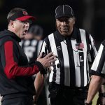 
              Louisville head coach Scott Satterfield speaks with officials during the first half of an NCAA college football game against Duke in Durham, N.C., Thursday, Nov. 18, 2021. (AP Photo/Gerry Broome)
            