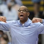 
              North Carolina head coach Hubert Davis reacts during the second half of an NCAA college basketball game against Loyola Maryland in Chapel Hill, N.C., Tuesday, Nov. 9, 2021. (AP Photo/Gerry Broome)
            