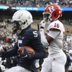 
              Penn State wide receiver Jahan Dotson (5) scores a second-quarter touchdown in front of Rutgers defensive back Max Melton (16) during an NCAA college football game in State College, Pa., Saturday, Nov. 20, 2021. (AP Photo/Barry Reeger)
            
