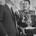 
              FILE - Van C. Kussrow, left, from the Orange Bowl Committee, presents Baltimore Colts quarterback Tom Matte with the Most Valuable Player trophy after the Colts defeated the Dallas Cowboys 53-3 on Jan. 9, 1966, in Miami.  Matte, who spent his entire 12-year NFL career as a gritty running back for the Baltimore Colts _ except for a star turn for three games in 1965 as their quarterback _ has died. He was 82. The Baltimore Ravens confirmed Matte's death during coach John Harbaugh's news conference Wednesday, Nov. 3, 2021. No details were provided.(AP Photo/File)
            