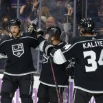 
              Los Angeles Kings forwards Brendan Lemieux, center, celebrates his goal with Arthur Kaliyev, right, and defenseman Alexander Edler uring the second period of an NHL hockey game against the Arizona Coyotes Sunday, Nov. 21, 2021, in Los Angeles. (AP Photo/Ringo H.W. Chiu)
            