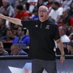 
              Omaha coach Derrin Hansen yells to players during the first half of the team's NCAA college basketball game against Texas Tech on Tuesday, Nov. 23, 2021, in Lubbock, Texas. (Brad Tollefson/Lubbock Avalanche-Journal via AP)
            
