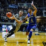 
              Purdue guard Sasha Stefanovic (55) drives on Indiana State guard Cooper Neese (4) during the first half of an NCAA college basketball game in West Lafayette, Ind., Friday, Nov. 12, 2021. (AP Photo/Michael Conroy)
            