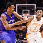 
              Tennessee guard Kennedy Chandler (1) drives as Presbyterian forward Winston Hill (4) defends during an NCAA college basketball game Tuesday, Nov. 30, 2021, in Knoxville, Tenn. (AP Photo/Wade Payne)
            
