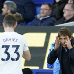 
              Tottenham's head coach Antonio Conte, right, gives instructions to Tottenham's Ben Davies during the English Premier League soccer match between Everton and Tottenham Hotspur at Goodison Park in Liverpool, England, Sunday, Nov. 7, 2021. (AP Photo/Jon Super)
            