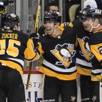 
              Pittsburgh Penguins' Evan Rodrigues, center celebrates his goal during the second period of the team's NHL hockey game against the Florida Panthers in Pittsburgh, Thursday, Nov. 11, 2021. (AP Photo/Gene J. Puskar)
            