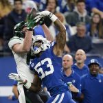 
              New York Jets' Tyler Kroft (81) makes a catch against Indianapolis Colts' Darius Leonard (53) during the first half of an NFL football game, Thursday, Nov. 4, 2021, in Indianapolis. (AP Photo/Michael Conroy)
            