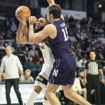 
              Wake Forest forward Dallas Walton (13) is pressured by Northwestern center Ryan Young (15) in the first half of an NCAA college basketball game on Tuesday, Nov. 30, 2021, at the Joel Coliseum in Winston-Salem, N.C. (Allison Lee Isley/The Winston-Salem Journal via AP)
            