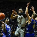 
              Purdue guard Jaden Ivey (23) looses the ball between Indiana State guards Cameron Henry (41) and Cooper Neese (4)during the first half of an NCAA college basketball game in West Lafayette, Ind., Friday, Nov. 12, 2021. (AP Photo/Michael Conroy)
            