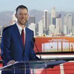 
              Lincoln Riley, the new head football coach of the University of Southern California, speaks during a ceremony in Los Angeles, Monday, Nov. 29, 2021. (AP Photo/Ashley Landis)
            