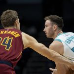 
              Cleveland Cavaliers forward Lauri Markkanen (24) defends Charlotte Hornets forward Gordon Hayward (20) during the first half of an NBA basketball game, Monday, Nov. 1, 2021, in Charlotte, N.C. (AP Photo/Matt Kelley)
            