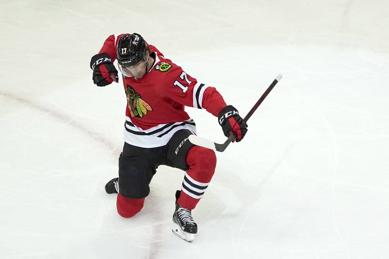 Chicago Blackhawks' Dylan Strome celebrates his goal during the third period of an NHL hockey game ...