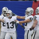 
              Las Vegas Raiders' Hunter Renfrow (13) celebrates with teammates after catching a pass for a touchdown during the first half of an NFL football game against the New York Giants, Sunday, Nov. 7, 2021, in East Rutherford, N.J. (AP Photo/Bill Kostroun)
            