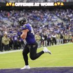 
              Baltimore Ravens fullback Patrick Ricard (42) runs his reception into the end zone for a touchdown during the second half of an NFL football game against the Minnesota Vikings, Sunday, Nov. 7, 2021, in Baltimore. (AP Photo/Nick Wass)
            