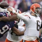 
              New England Patriots defensive end Deatrich Wise (91) forces Cleveland Browns quarterback Baker Mayfield (6) to fumble during the first half of an NFL football game, Sunday, Nov. 14, 2021, in Foxborough, Mass. (AP Photo/Steven Senne)
            