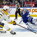 
              Toronto Maple Leafs goaltender Jack Campbell saves a shot by Nashville Predators' Philip Tomasino during the first period of an NHL hockey game in Toronto, Tuesday, Nov. 16, 2021. (Chris Young/The Canadian Press via AP)
            