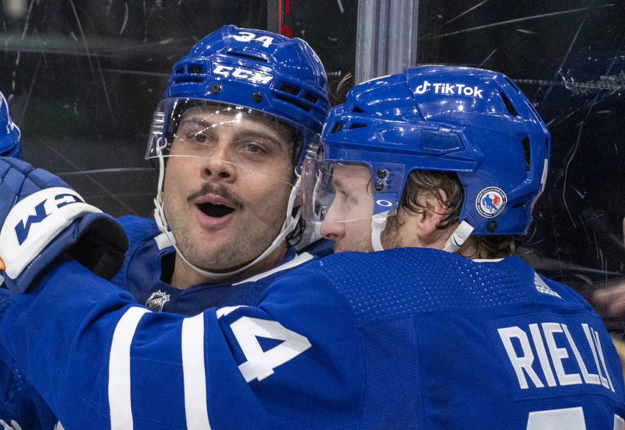 Toronto Maple Leafs centre Auston Matthews (34) celebrates his game winning goal with teammate Morg...