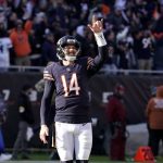 
              Chicago Bears quarterback Andy Dalton flashes the I Love You sign, as he celebrates his touchdown pass to Darnell Mooney during the second half of an NFL football game against the Baltimore Ravens Sunday, Nov. 21, 2021, in Chicago. (AP Photo/David Banks)
            