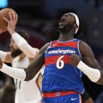 
              Washington Wizards center Montrezl Harrell (6) reacts to a foul called on New Orleans Pelicans center Jonas Valanciunas (17) during the second half of an NBA basketball game Monday, Nov. 15, 2021, in Washington. The Wizards won 105-100. (AP Photo/Nick Wass)
            