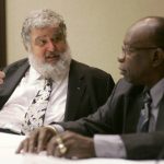 
              FILE - In this Jan. 28, 2008, CONCACAF General Secretary Chuck Blazer, left, and President Jack Warner chat during a news conference in Miami. Just ahead of the 2010 World Cup soccer bid, Diligence, a well-known private investigative firm in London founded by former western intelligence officers, was tasked to obtain communications and financial records of FIFA officials Warner and Blazer, a review of records obtained by The Associated Press show. Blazer, a former top U.S. soccer official who pleaded guilty to FIFA-related corruption charges and worked as an informant for the FBI, died in 2017. (AP Photo/Wilfredo Lee, File)
            