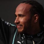 
              Mercedes driver Lewis Hamilton, of Britain, waves at the fans after coming in first in the Brazilian Formula One Grand Prix in Sao Paulo, Brazil, Sunday, Nov. 14, 2021. (Lars Baron, Pool Photo via AP)
            