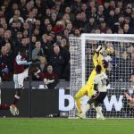 
              West Ham's Kurt Zouma, second from right, scores his side's 3rd goal during the English Premier League soccer match between West Ham United and Liverpool at the London stadium in London, England, Sunday, Nov. 7, 2021. (AP Photo/Ian Walton)
            