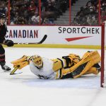 
              Ottawa Senators' Parker Kelly (45) scores past Pittsburgh Penguins goaltender Casey DeSmith (1) for a goal  during the second period of an NHL hockey game in Ottawa, on Saturday, Nov. 13, 2021. (Justin Tang/The Canadian Press via AP)
            