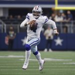 
              Dallas Cowboys quarterback Dak Prescott (4) runs the ball for a long gain in the first half of an NFL football game against the Denver Broncos in Arlington, Texas, Sunday, Nov, 7, 2021. (AP Photo/Ron Jenkins)
            