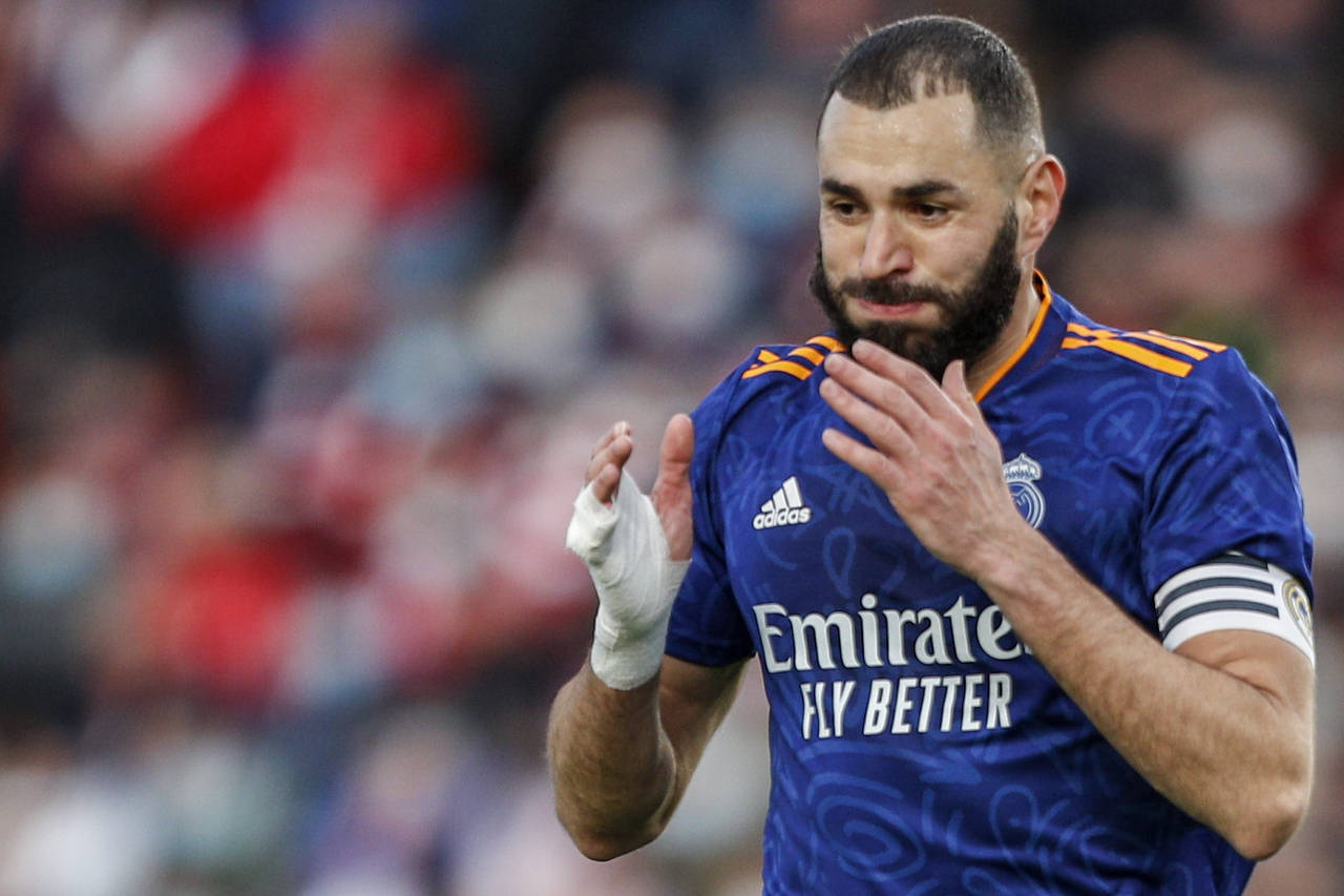 Real Madrid's Karim Benzema reacts after failing a chance to score during a Spanish La Liga soccer ...