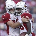 
              Arizona Cardinals running back Eno Benjamin, right, celebrates with quarterback Colt McCoy after scoring against the San Francisco 49ers during the second half of an NFL football game in Santa Clara, Calif., Sunday, Nov. 7, 2021. (AP Photo/Jed Jacobsohn)
            