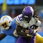 
              Los Angeles Chargers middle linebacker Kenneth Murray (9) tackles Minnesota Vikings running back Dalvin Cook (33) during the first half of an NFL football game Sunday, Nov. 14, 2021, in Inglewood, Calif. (AP Photo/Marcio Jose Sanchez)
            