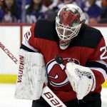
              New Jersey Devils goaltender Mackenzie Blackwood makes a save against the New York Islanders during the second period of an NHL hockey game Thursday, Nov. 11, 2021, in Newark, N.J. (AP Photo/Adam Hunger)
            