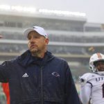 
              UTSA head coach Jeff Traylor signals to the crowd after losing an NCAA college football game against North Texas in Denton, Texas, Saturday, Nov. 27, 2021. (AP Photo/Andy Jacobsohn)
            