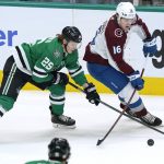 
              Colorado Avalanche right wing Nicolas Aube-Kubel (16) and Dallas Stars left wing Joel Kiviranta (25) skate for control of the puck during the first period of an NHL hockey game in Dallas, Friday, Nov. 26, 2021. (AP Photo/LM Otero)
            