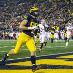 
              Michigan tight end Luke Schoonmaker scores a touchdown against Indiana during the first half of an NCAA college football game in Ann Arbor, Mich., Saturday, Nov. 6, 2021. (AP Photo/Tony Ding)
            