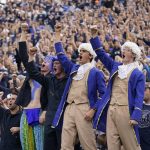 
              BYU fans celebrates after their team scores against Idaho State in the first half during an NCAA college football game Saturday, Nov. 6, 2021, in Provo, Utah. (AP Photo/Rick Bowmer)
            