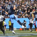 
              Tennessee Titans quarterback Ryan Tannehill (17) celebrates after scoring a touchdown against the New Orleans Saints in the first half of an NFL football game Sunday, Nov. 14, 2021, in Nashville, Tenn. (AP Photo/John Amis)
            