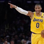
              Los Angeles Lakers guard Russell Westbrook directs the offense during the first half of an NBA basketball game against the Houston Rockets Tuesday, Nov. 2, 2021, in Los Angeles. (AP Photo/Marcio Jose Sanchez)
            
