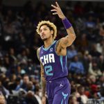 
              Charlotte Hornets guard Kelly Oubre Jr. (12) reacts after scoring a three point basket in the second half of an NBA basketball game against the Memphis Grizzlies Wednesday, Nov. 10, 2021, in Memphis, Tenn. (AP Photo/Brandon Dill)
            