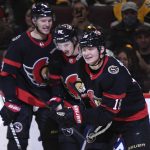 
              Ottawa Senators' Tim Stützle (18) celebrates with teamates after scoring against the Pittsburgh Penguins during the second period of an NHL hockey game in Ottawa, on Saturday, Nov. 13, 2021. (Justin Tang/The Canadian Press via AP)
            