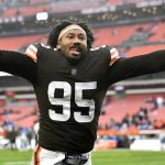 
              Cleveland Browns defensive end Myles Garrett celebrates after the Browns defeated the Detroit Lions 13-10 in an NFL football game, Sunday, Nov. 21, 2021, in Cleveland. (AP Photo/David Richard)
            