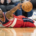 
              Washington Wizards guard Kentavious Caldwell-Pope (1) dives for the ball during the second half of an NBA basketball game against the Charlotte Hornets in Charlotte, N.C., Wednesday, Nov. 17, 2021. (AP Photo/Jacob Kupferman)
            